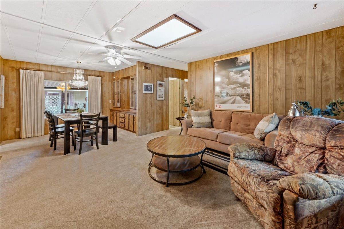 27 Primrose Lane Grass Valley, CA 95945 - Photo 3 of 44 a living room with furniture and a large window