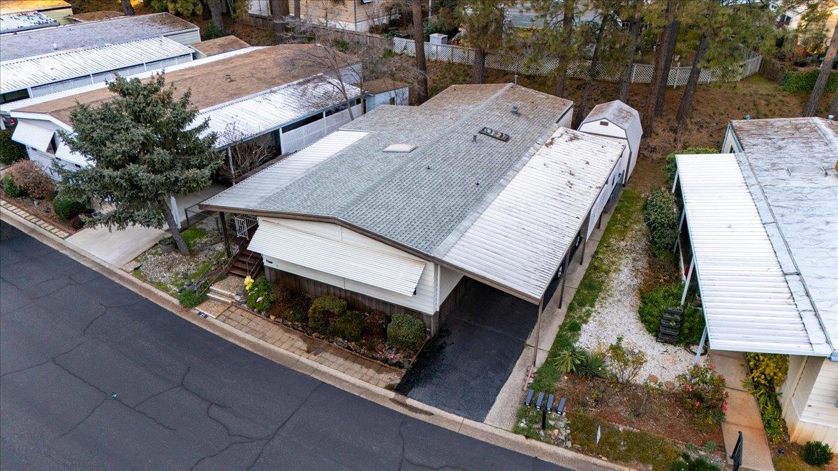 27 Primrose Lane Grass Valley, CA 95945 - Photo 39 of 44 an aerial view of a house with a yard and potted plants