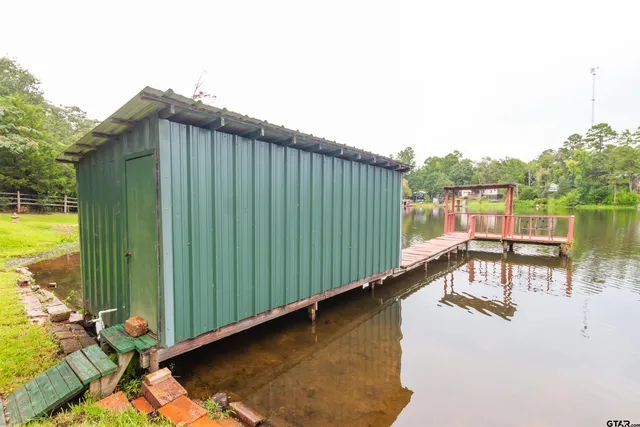 a view of a swimming pool with a lounge chairs