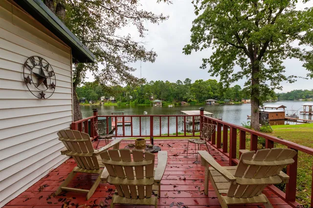 a view of a balcony with furniture