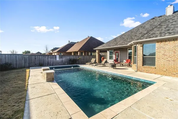 a view of outdoor space yard and swimming pool
