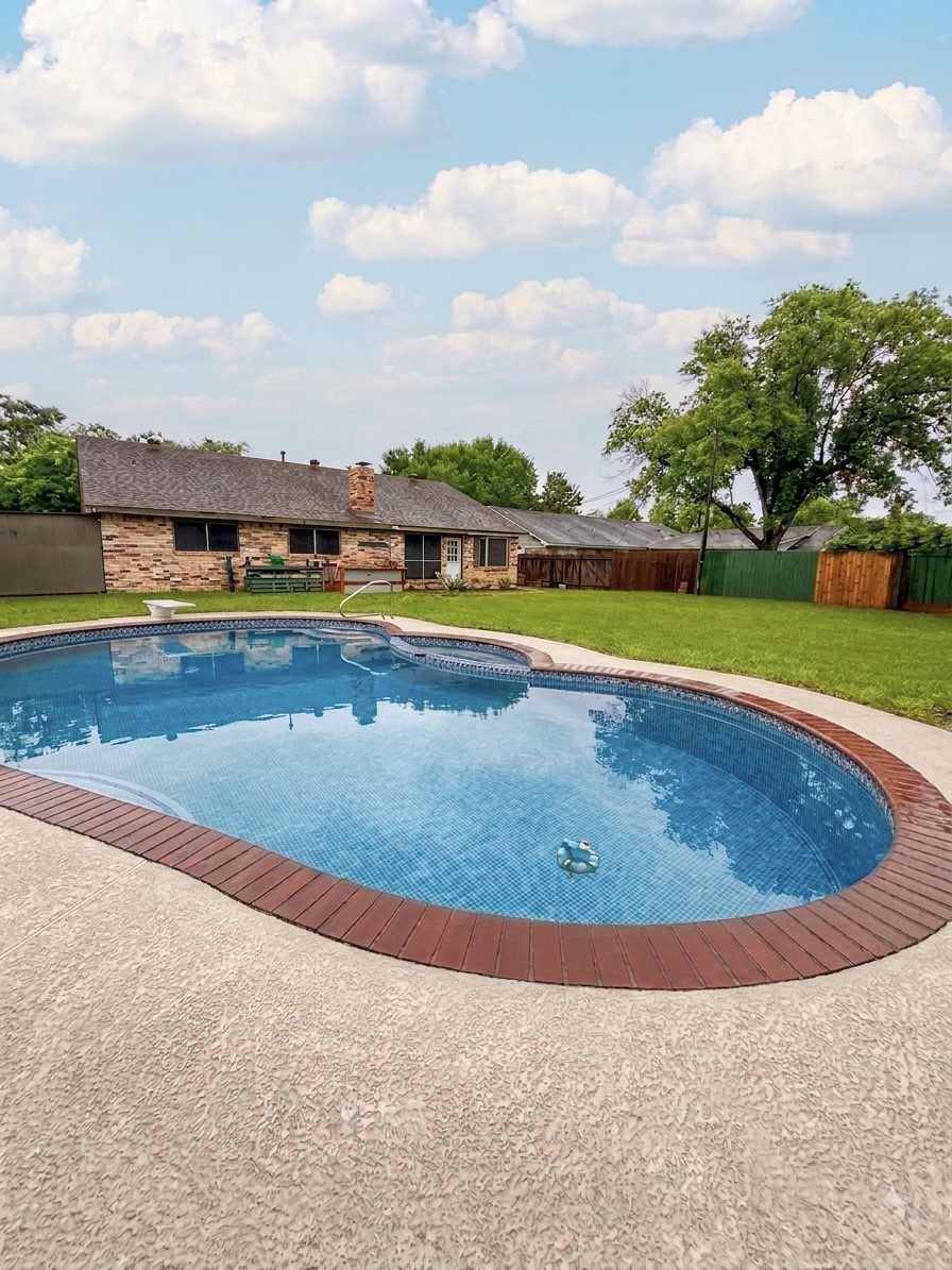 2203 South Houston Road Pasadena, TX 77502 - Photo 17 of 18 Perfect for this hot summer, sparkling pool.