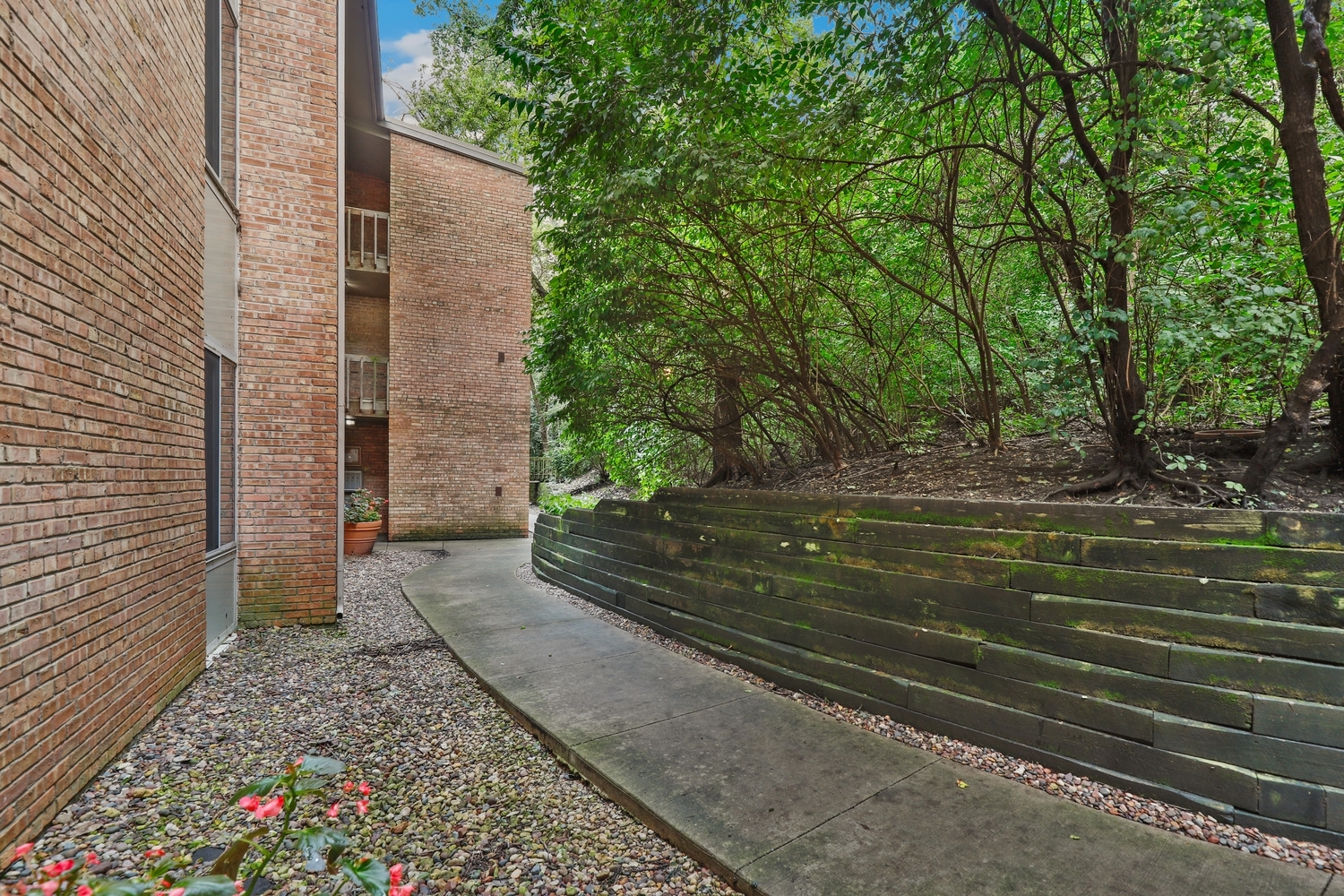 5902 Forest View Road, Unit 2D Lisle, IL 60532 - Photo 19 of 27 a view of a house with a yard