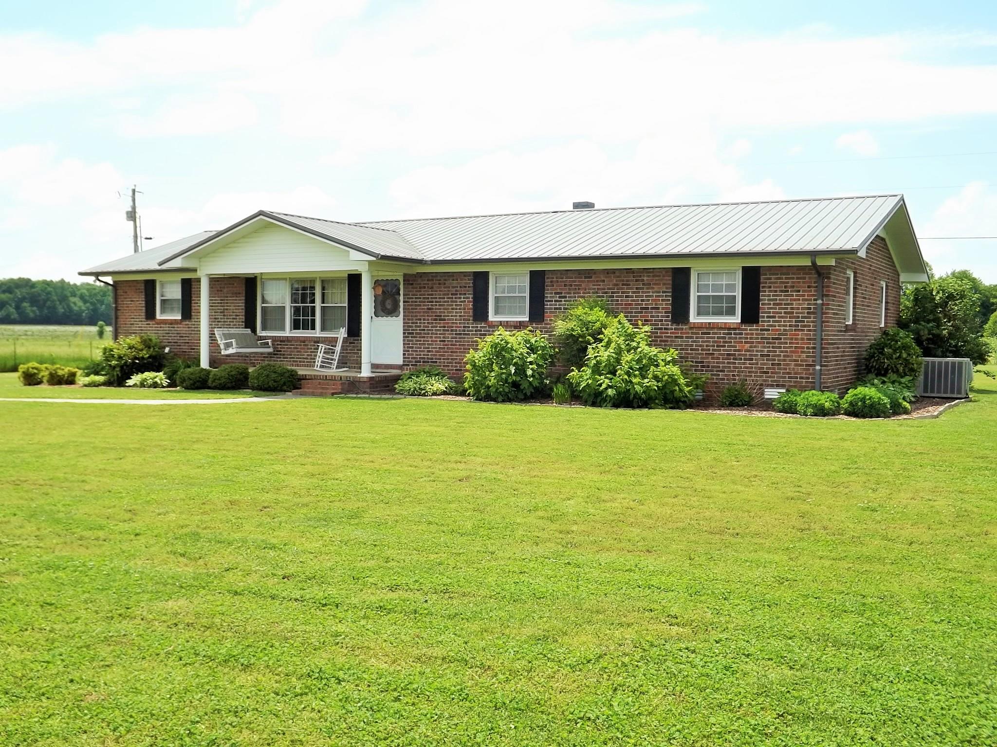 154 Hodge Road Manchester, TN 37355 - Photo 2 of 20 a front view of a house with a yard