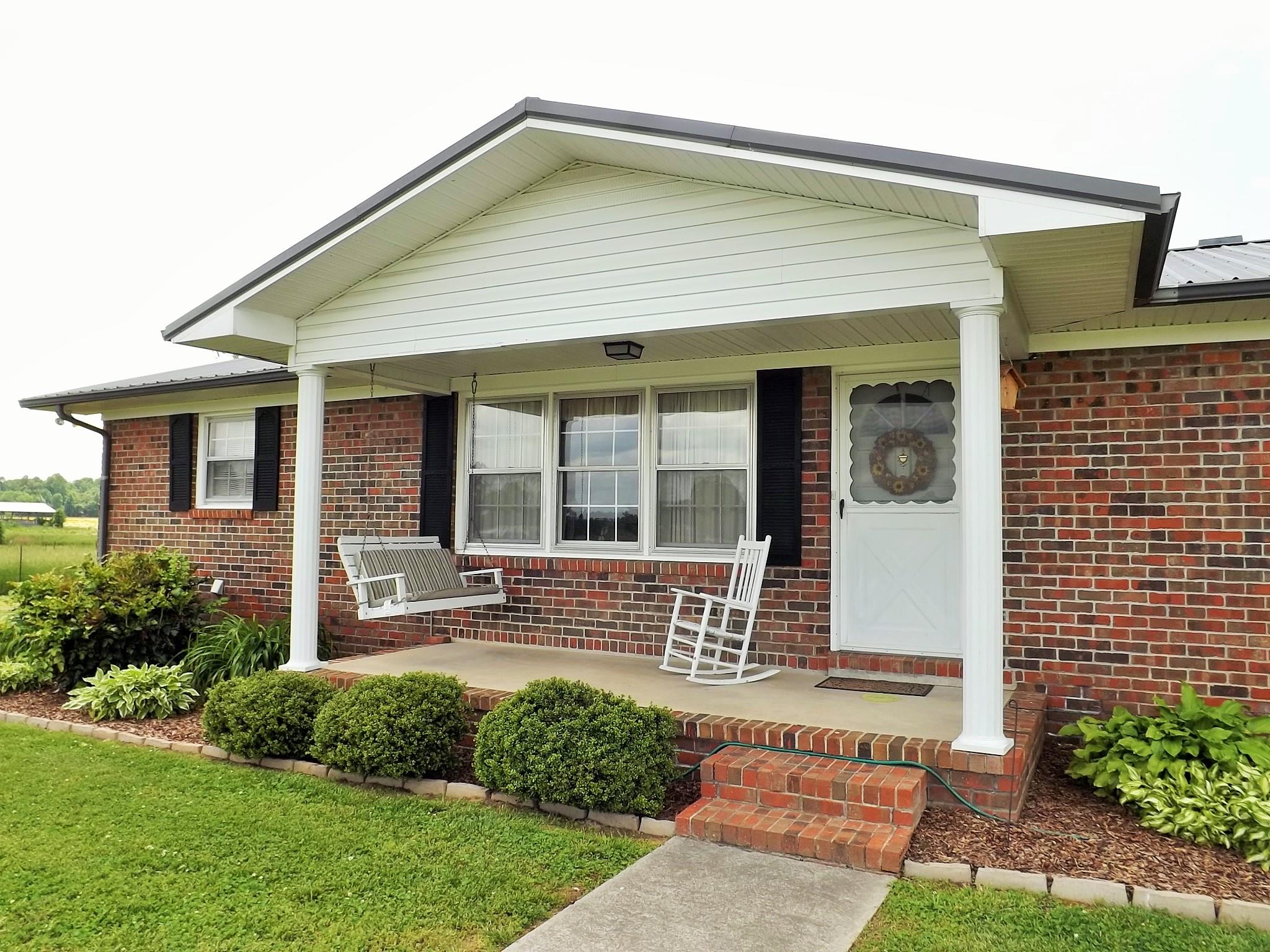 154 Hodge Road Manchester, TN 37355 - Photo 3 of 20 a front view of a house with a yard