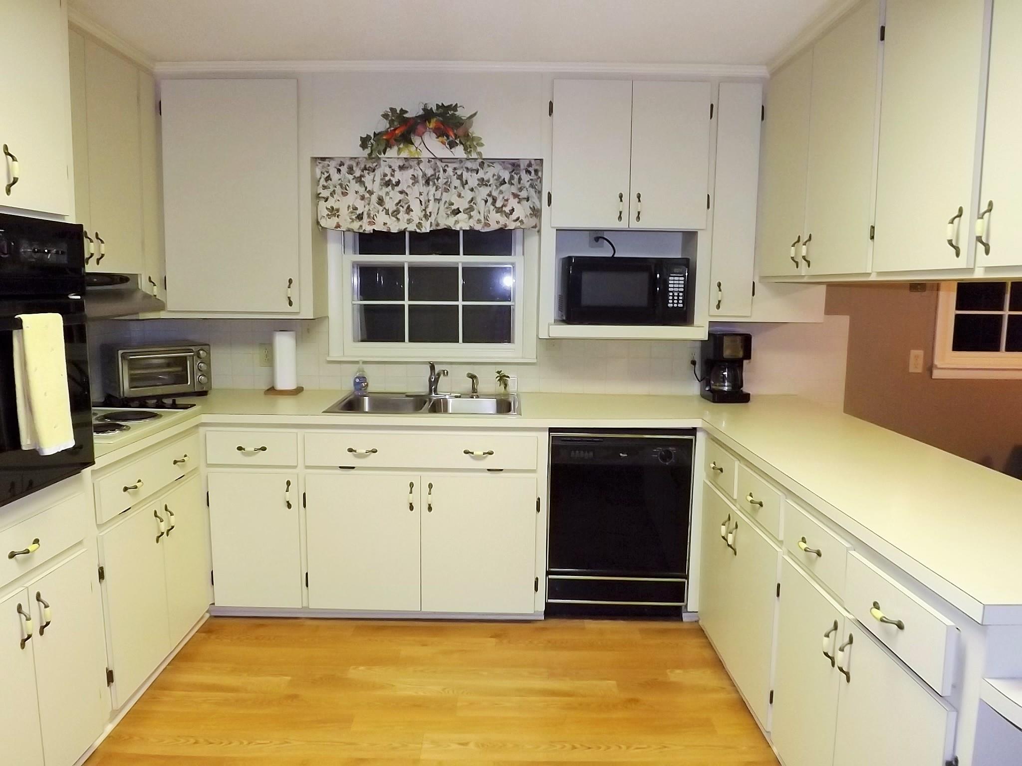 154 Hodge Road Manchester, TN 37355 - Photo 9 of 20 a kitchen with cabinets appliances and a counter space