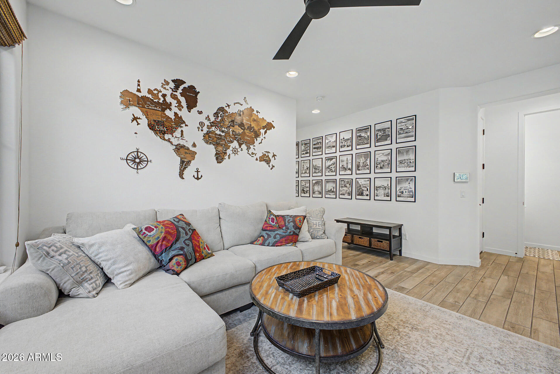 819 West Deer Creek Road Phoenix, AZ 85048 - Photo 16 of 76 a living room with furniture and a couch