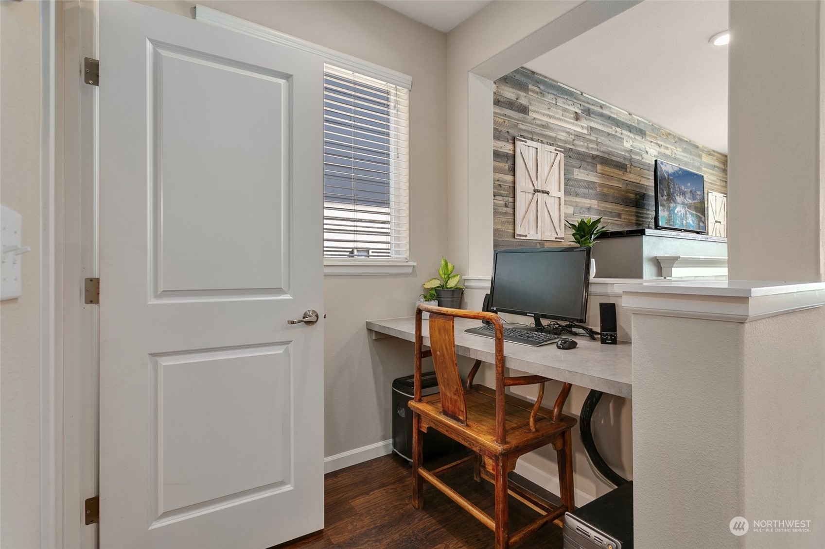 15931 Meridian Avenue South Bothell, WA 98012 - Photo 15 of 40 a workspace with furniture and a window