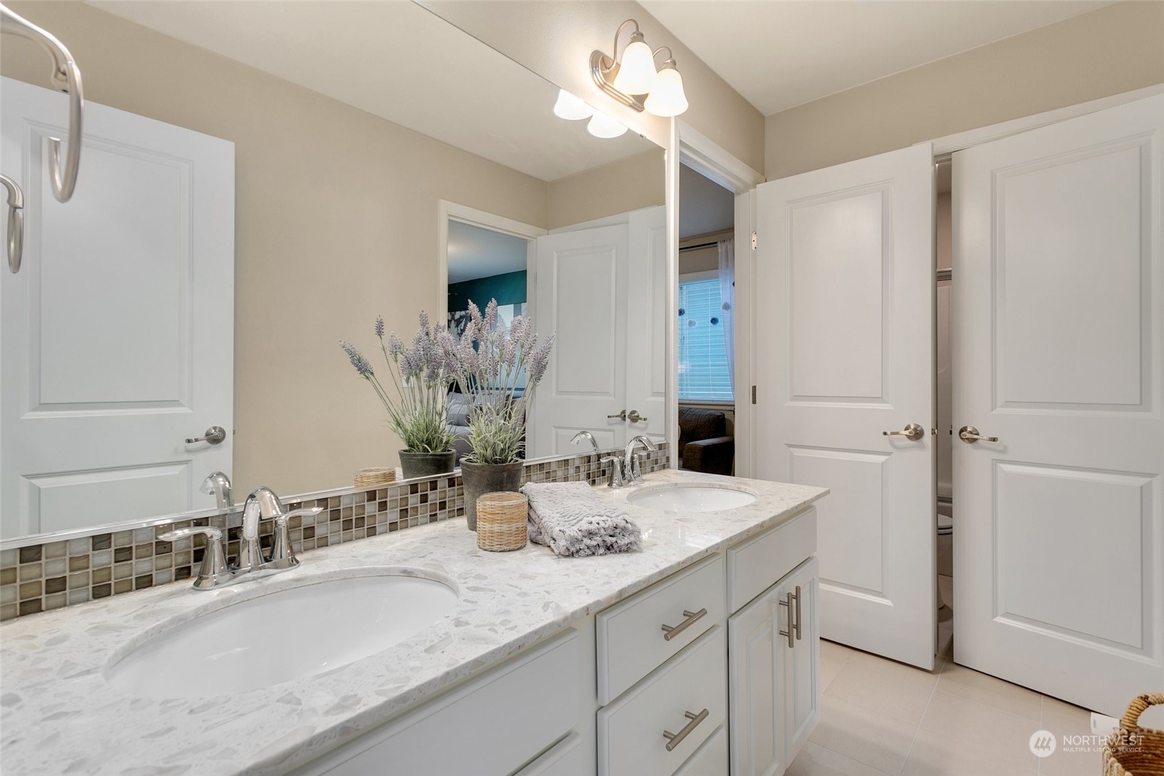 15931 Meridian Avenue South Bothell, WA 98012 - Photo 26 of 40 a bathroom with a granite countertop sink and a mirror