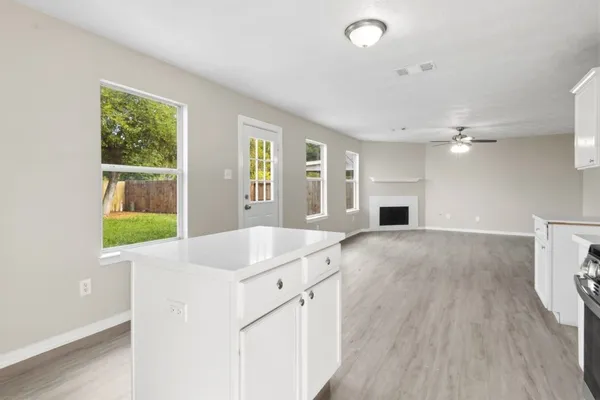 a view of kitchen and a window