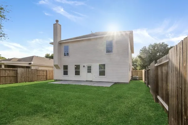 a house view with a garden space
