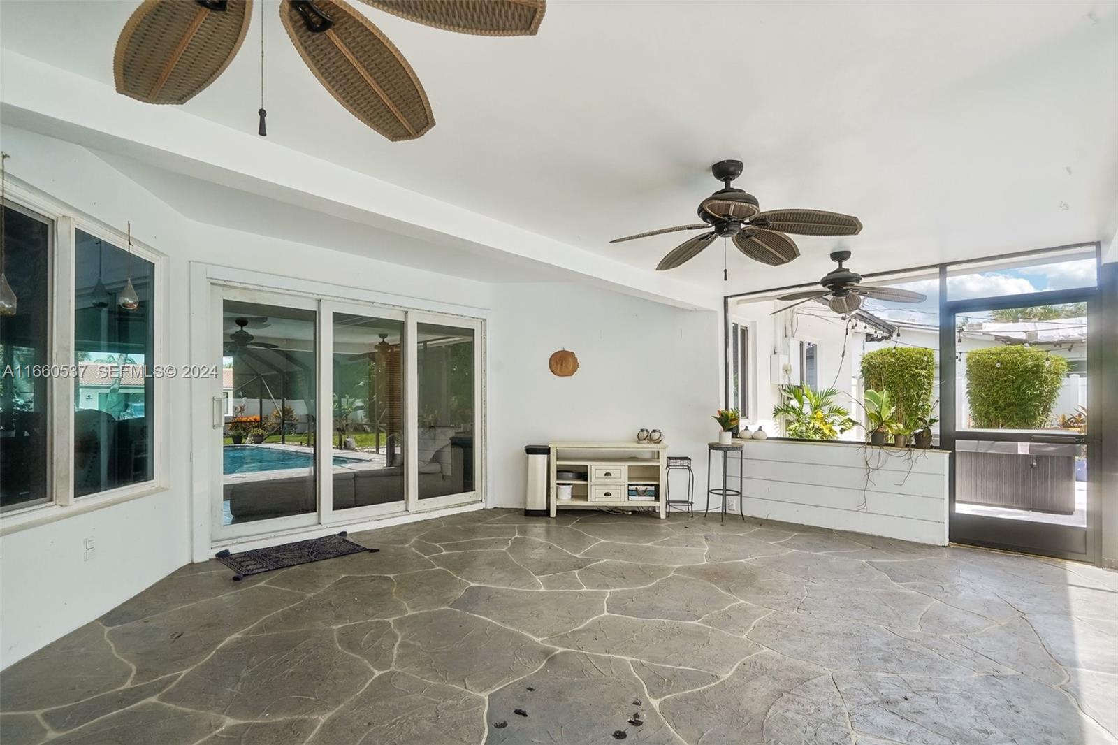 1164 Southwest 14th Street Boca Raton, FL 33486 - Photo 6 of 54 Oversized covered lanai