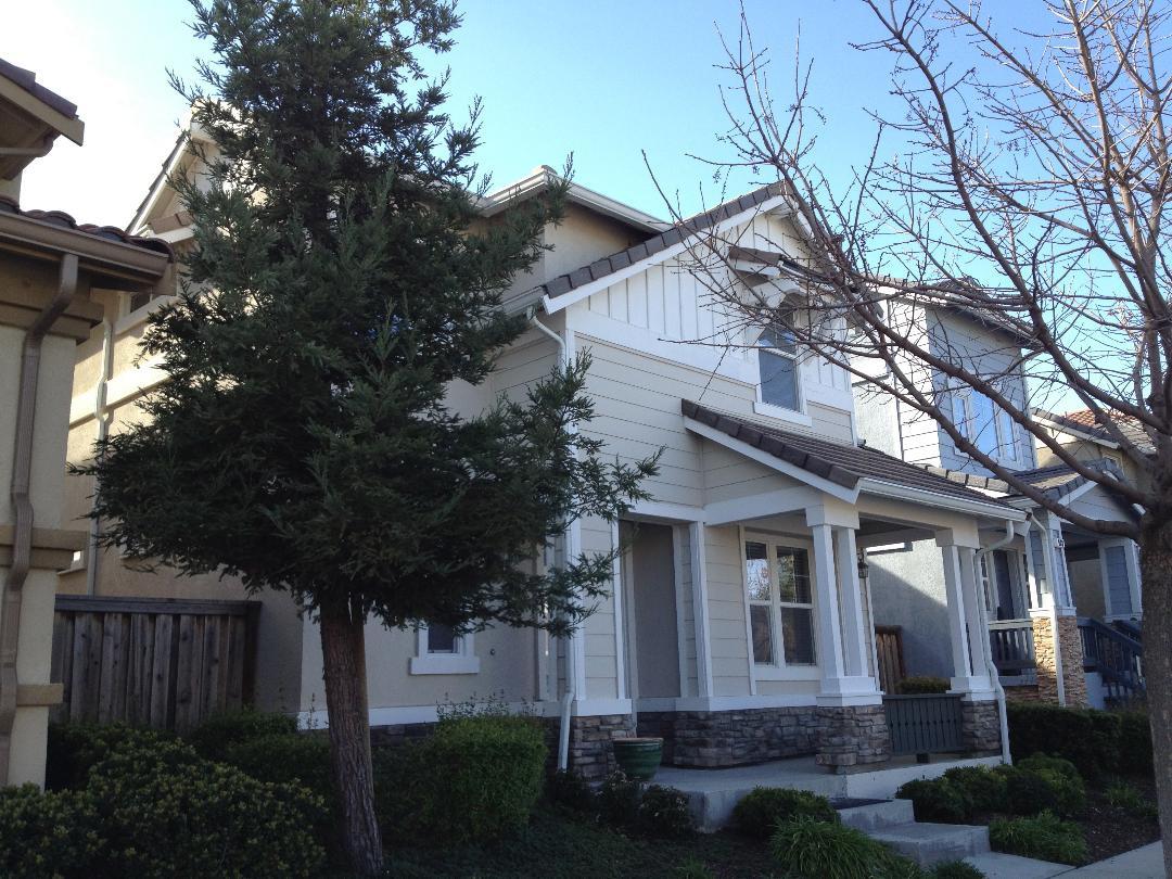 936 Oxford Lane Brentwood, CA 94513 - Photo 1 of 45 a front view of a house with garden