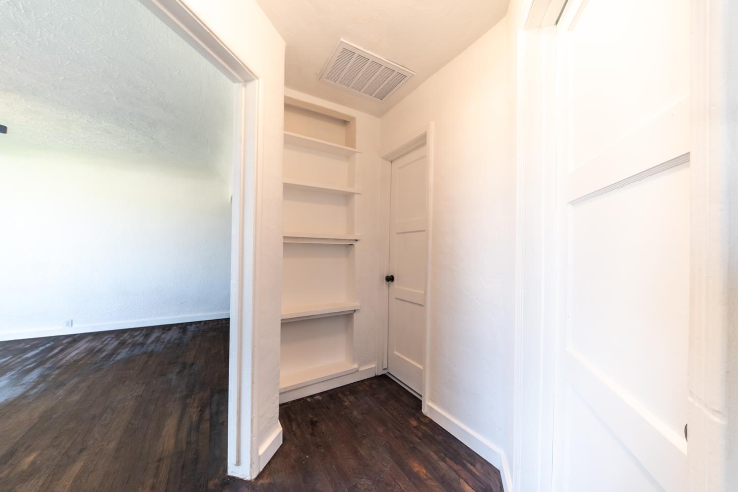 2790 Boles Street Madera, CA 93637 - Photo 11 of 19 a view of walk in closet with empty racks