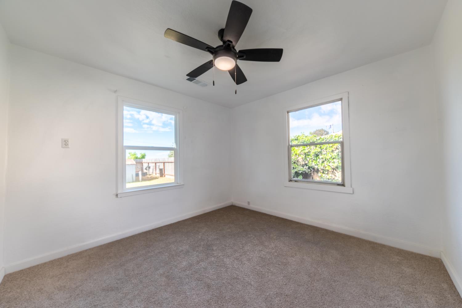 2790 Boles Street Madera, CA 93637 - Photo 12 of 19 a view of an empty room with a window