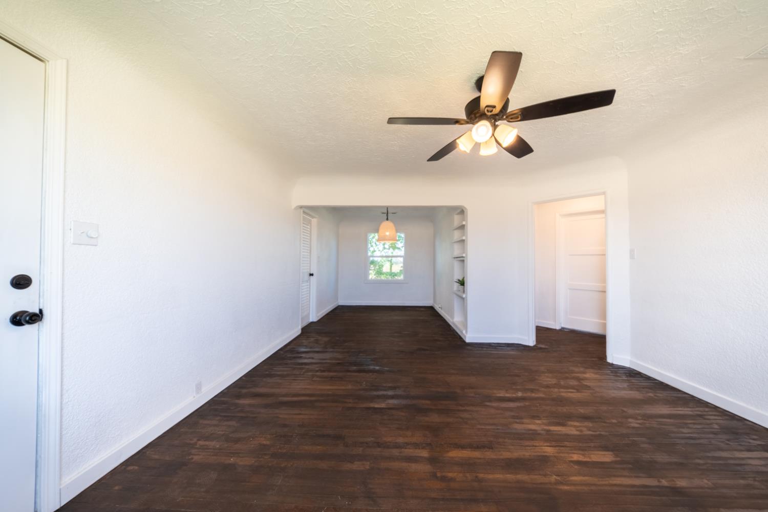2790 Boles Street Madera, CA 93637 - Photo 4 of 19 a view of empty room with wooden floor