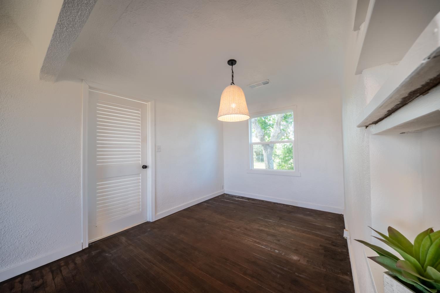 2790 Boles Street Madera, CA 93637 - Photo 7 of 19 a view of an empty room with a window