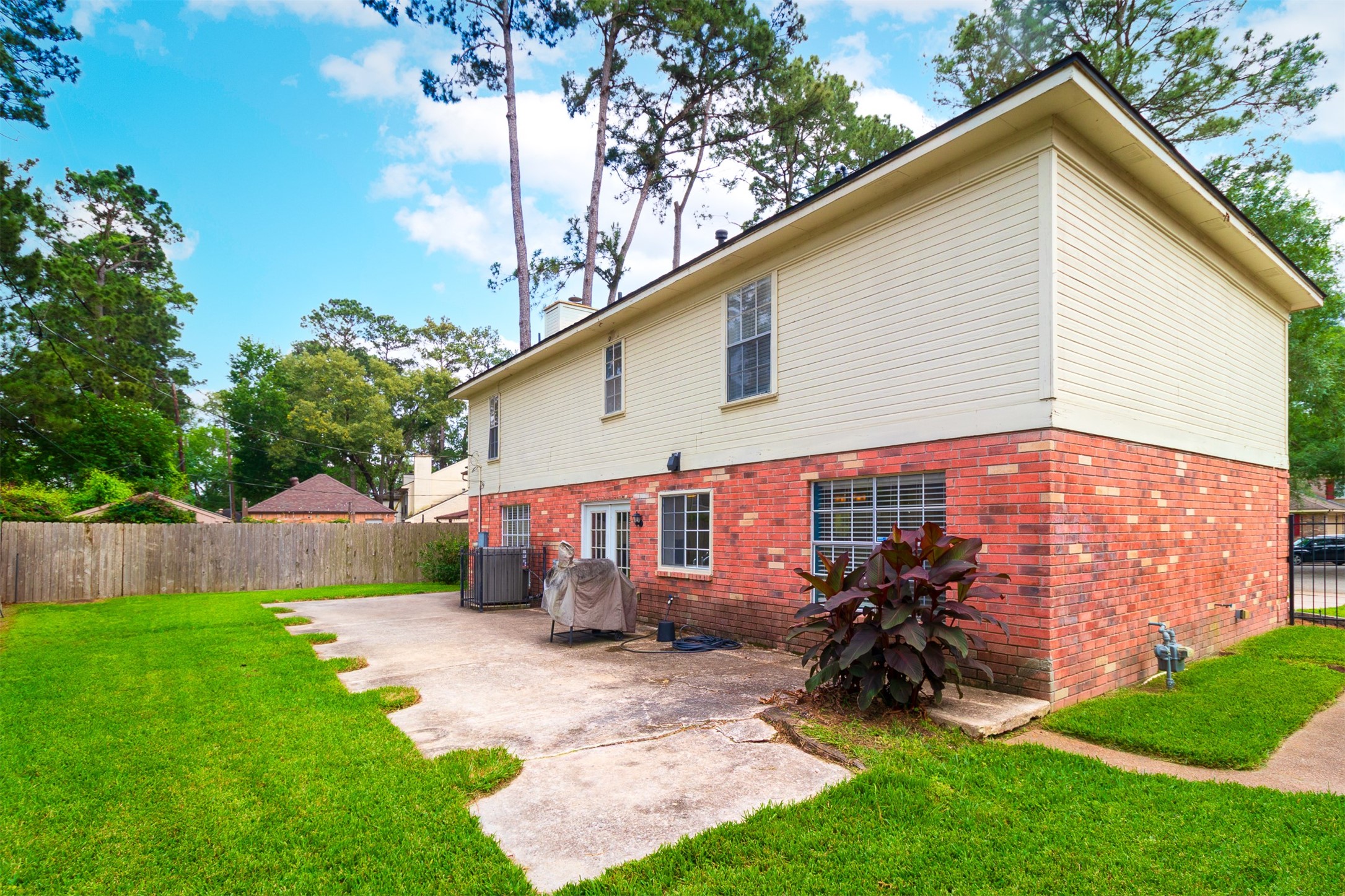 20214 Woodsboro Court Spring, TX 77388 - Photo 40 of 50 PRIVATE FENCED BACK YARD! HUGE Patio ready for Outdoor Living! LENNOX 17 SEER AC in 2018! TANKLESS WATER HEATER in 2025!