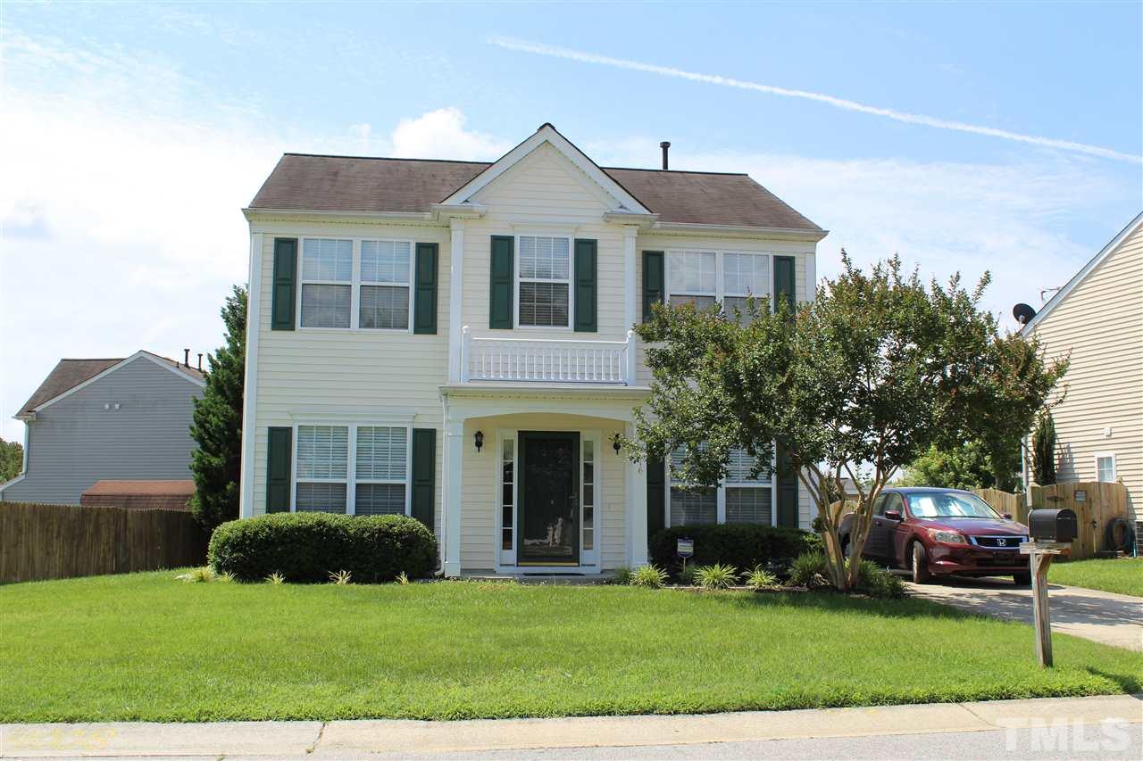 4016 Crowfield Drive Raleigh, NC 27610 - Photo 1 of 20 a front view of a house with a yard and trees