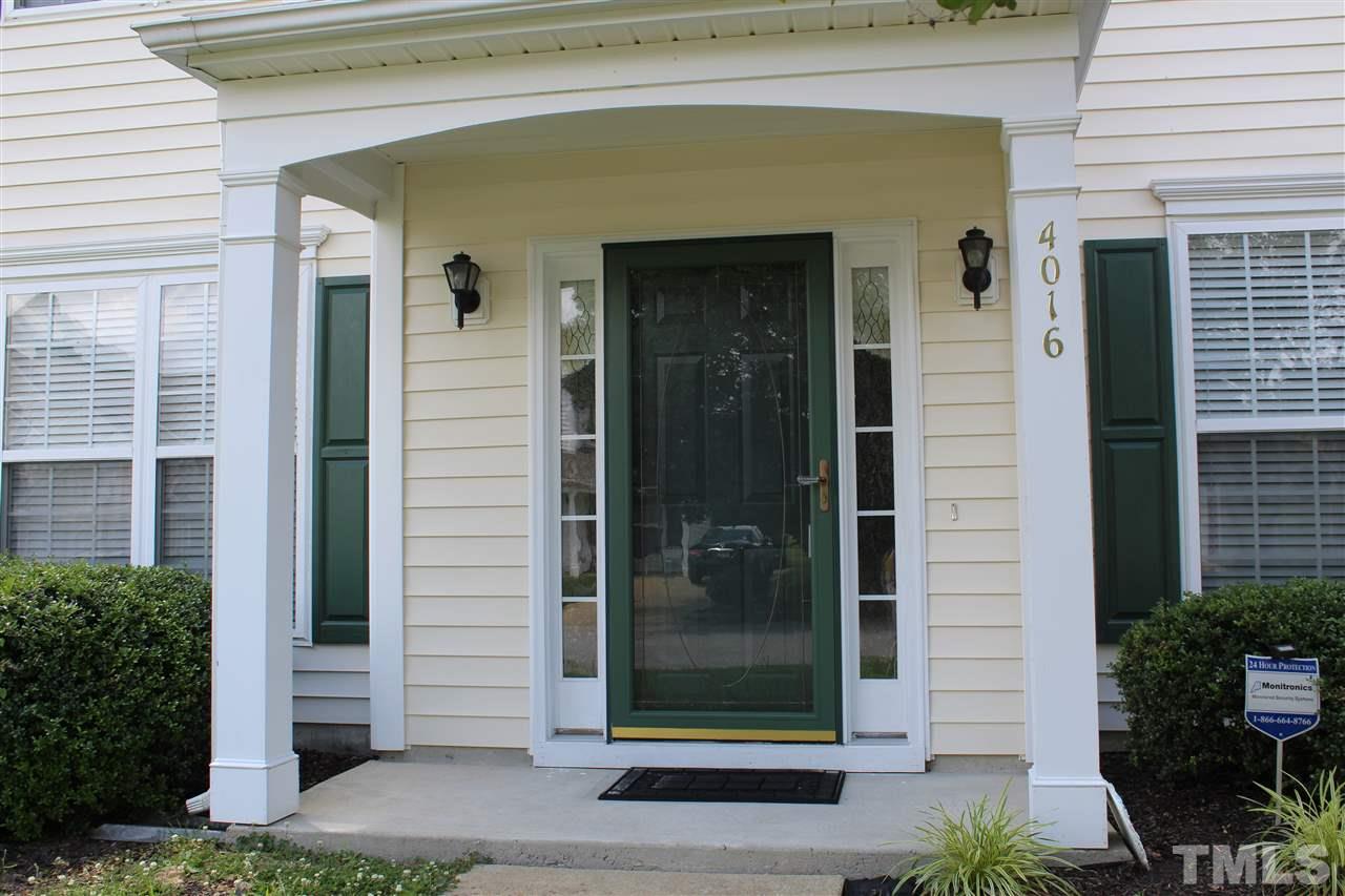 4016 Crowfield Drive Raleigh, NC 27610 - Photo 2 of 20 a view of a door and brick windows