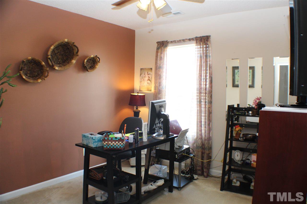 4016 Crowfield Drive Raleigh, NC 27610 - Photo 12 of 20 a dining room with furniture and window