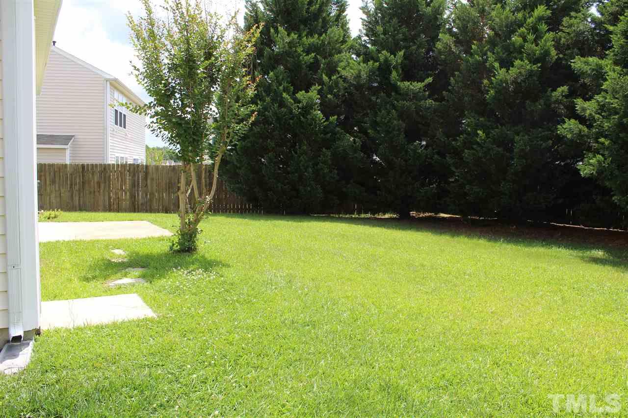 4016 Crowfield Drive Raleigh, NC 27610 - Photo 19 of 20 a view of yard with green space