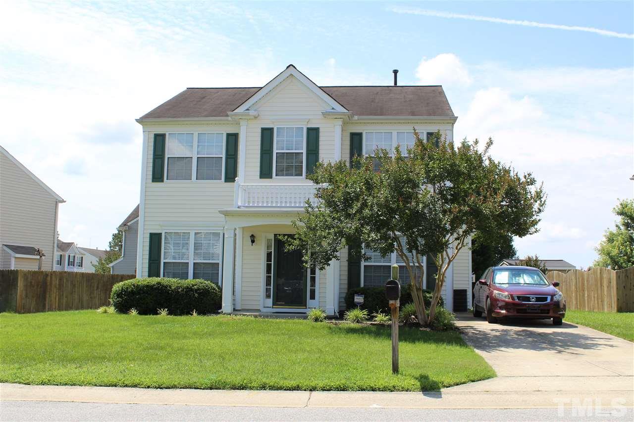 4016 Crowfield Drive Raleigh, NC 27610 - Photo 20 of 20 a front view of a house with a yard and garage
