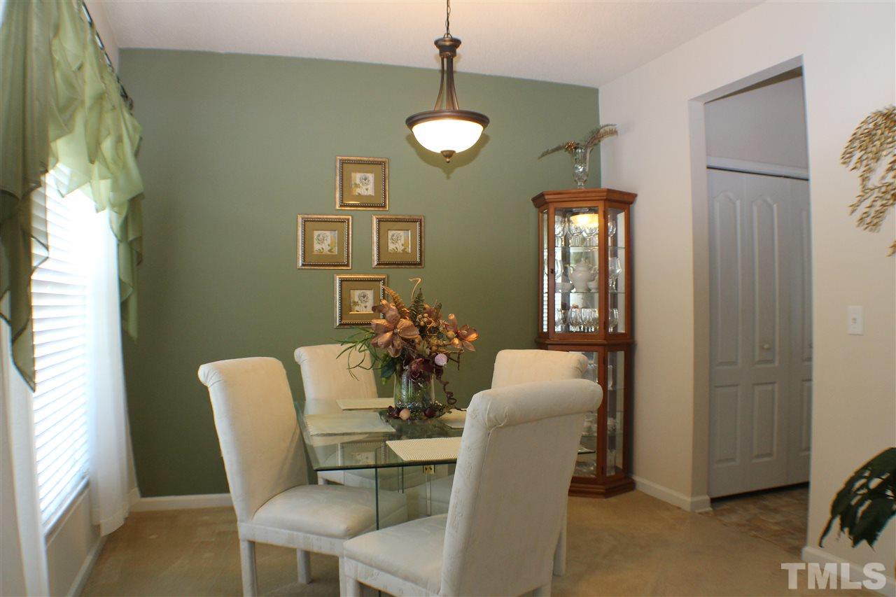 4016 Crowfield Drive Raleigh, NC 27610 - Photo 5 of 20 a dining room with furniture and window