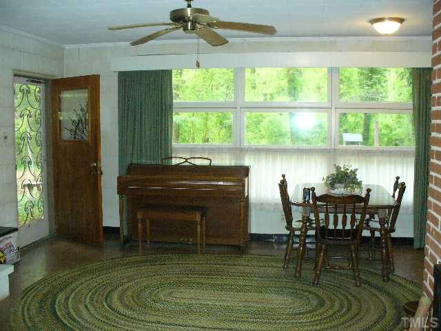 5333 Russell Road Durham, NC 27712 - Photo 10 of 15 a room with furniture and a window