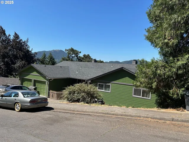 a car parked in front of a house