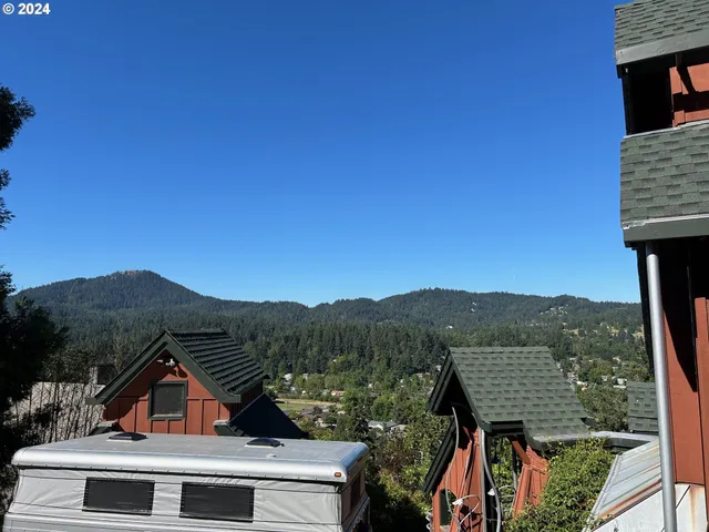 a view of houses with city view