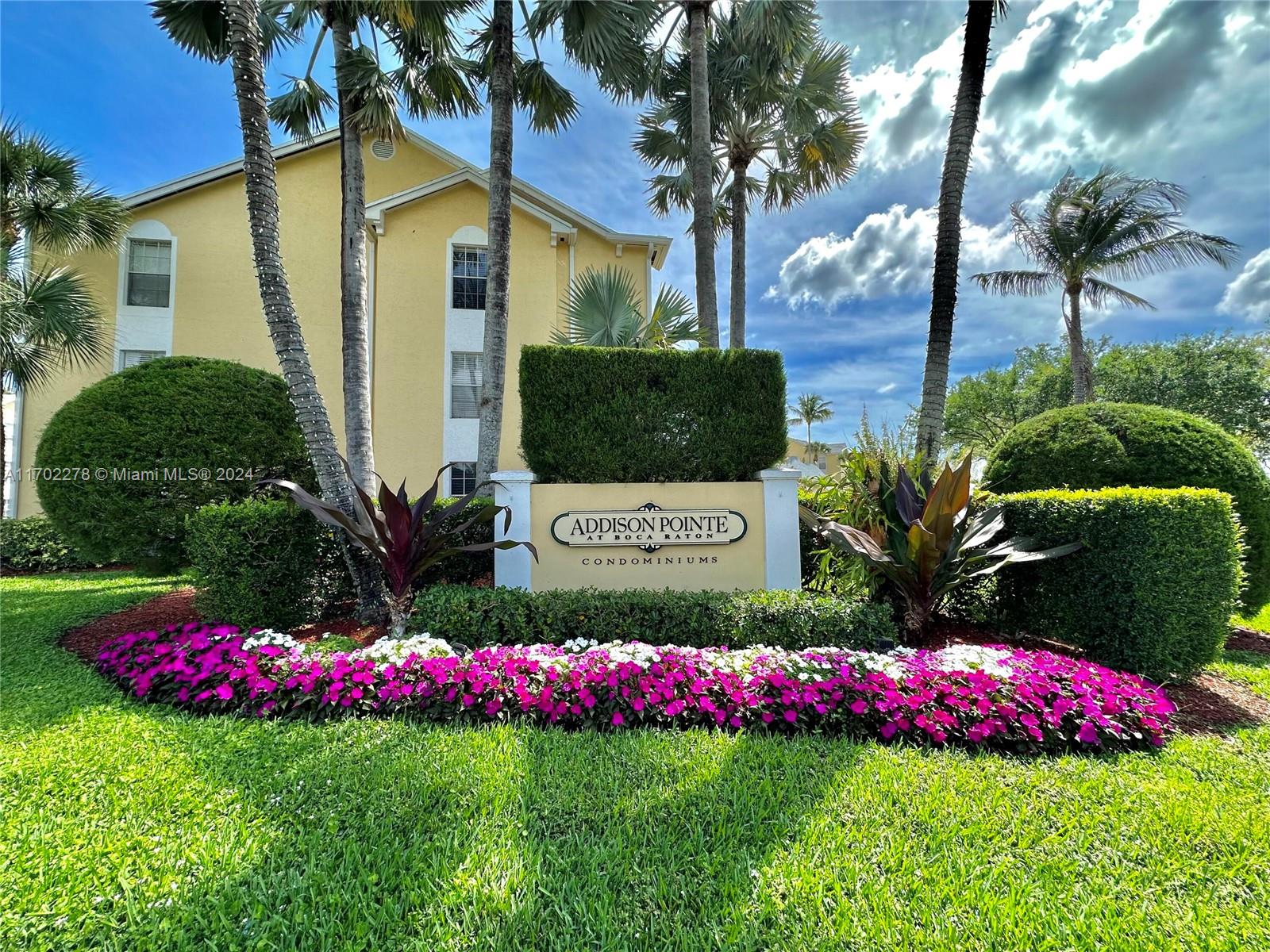 6299 La Costa Drive, Unit D Boca Raton, FL 33433 - Photo 1 of 23 a view of bunch of flowers and trees around