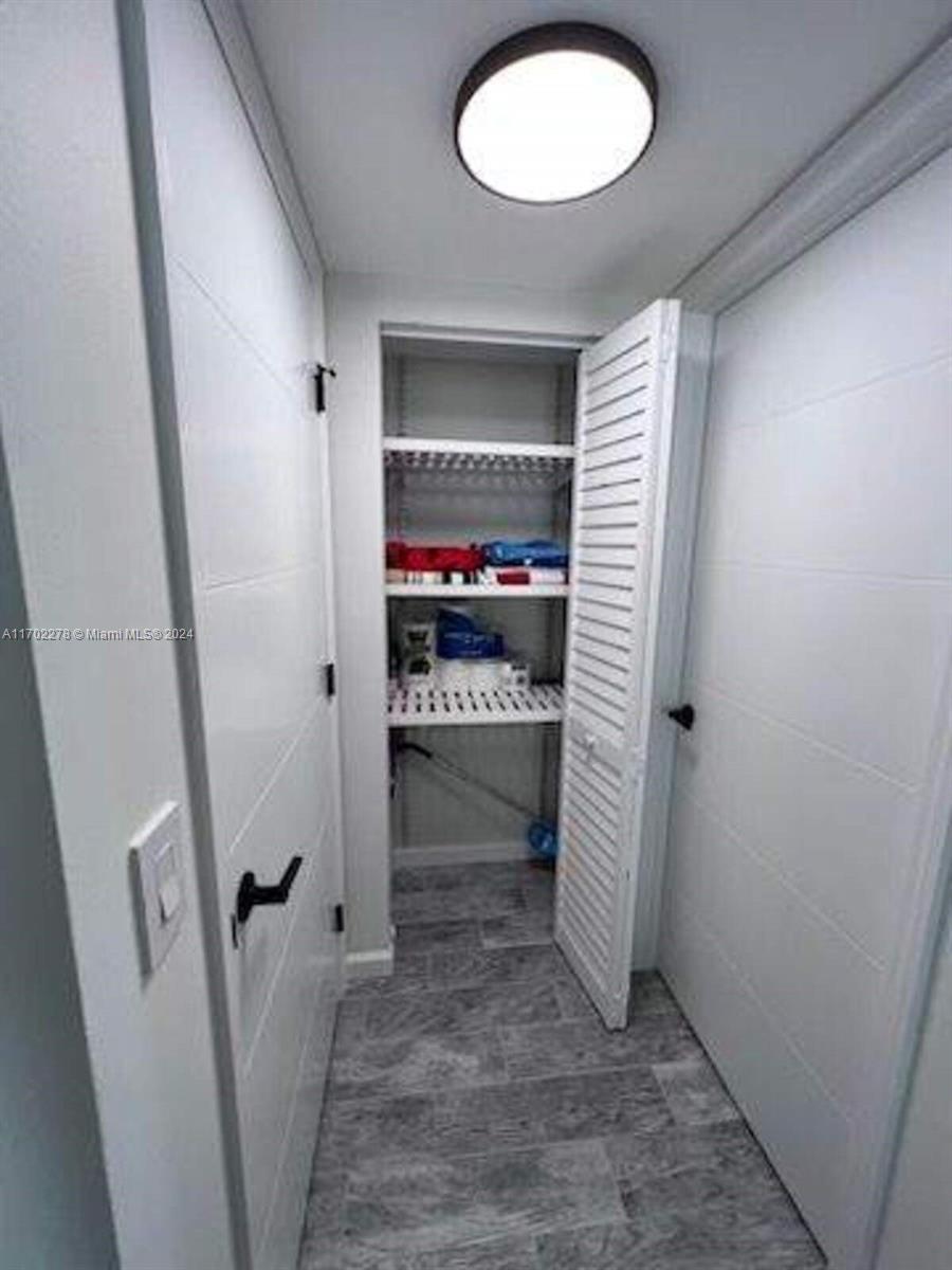 6299 La Costa Drive, Unit D Boca Raton, FL 33433 - Photo 23 of 23 a view of stairs