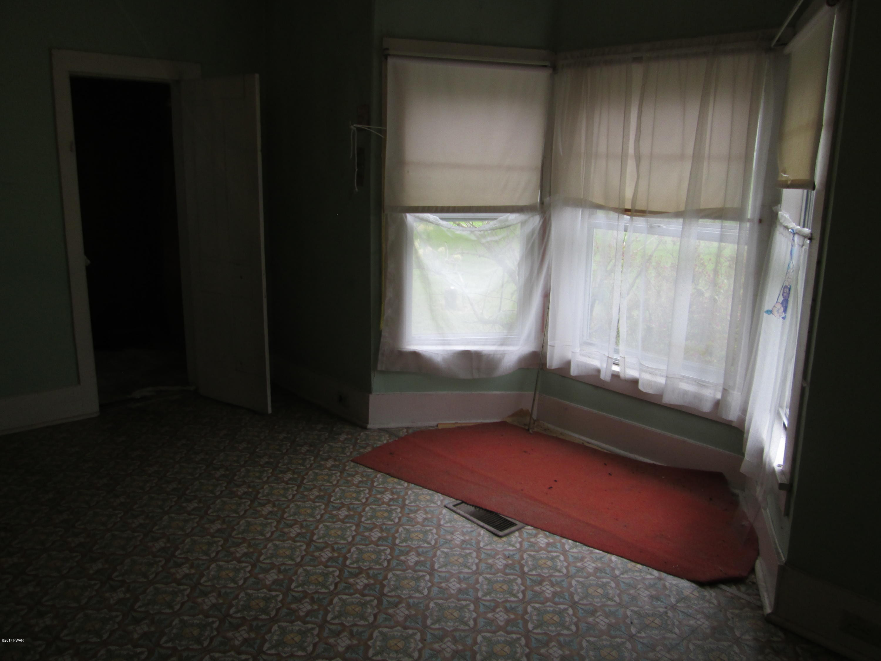 86 Beaver Hollow Road Lakewood, PA 18439 - Photo 29 of 30 a view of an empty room with a window