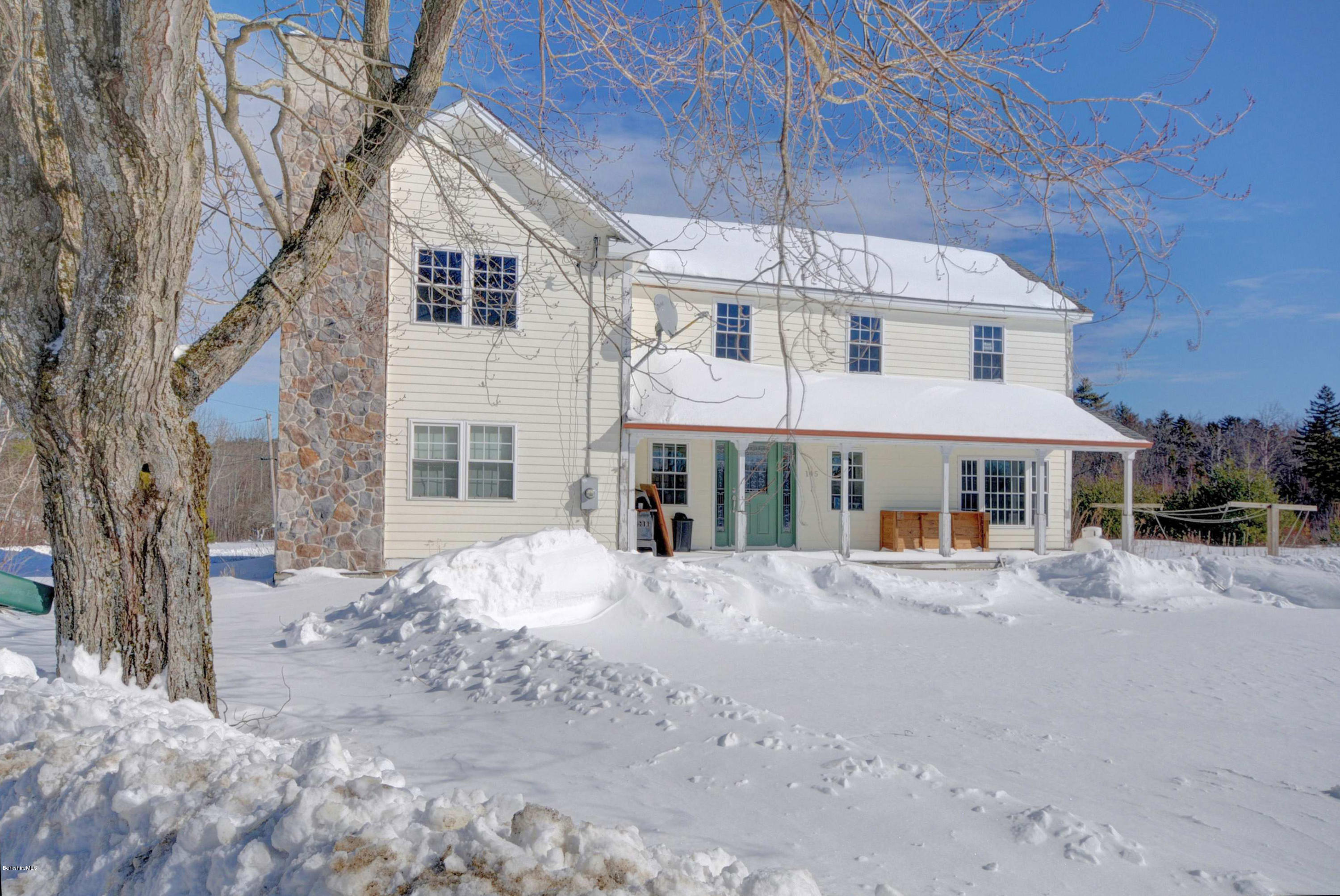 145 S Road Peru, MA 01235 - Photo 2 of 30 a front view of a house with a yard