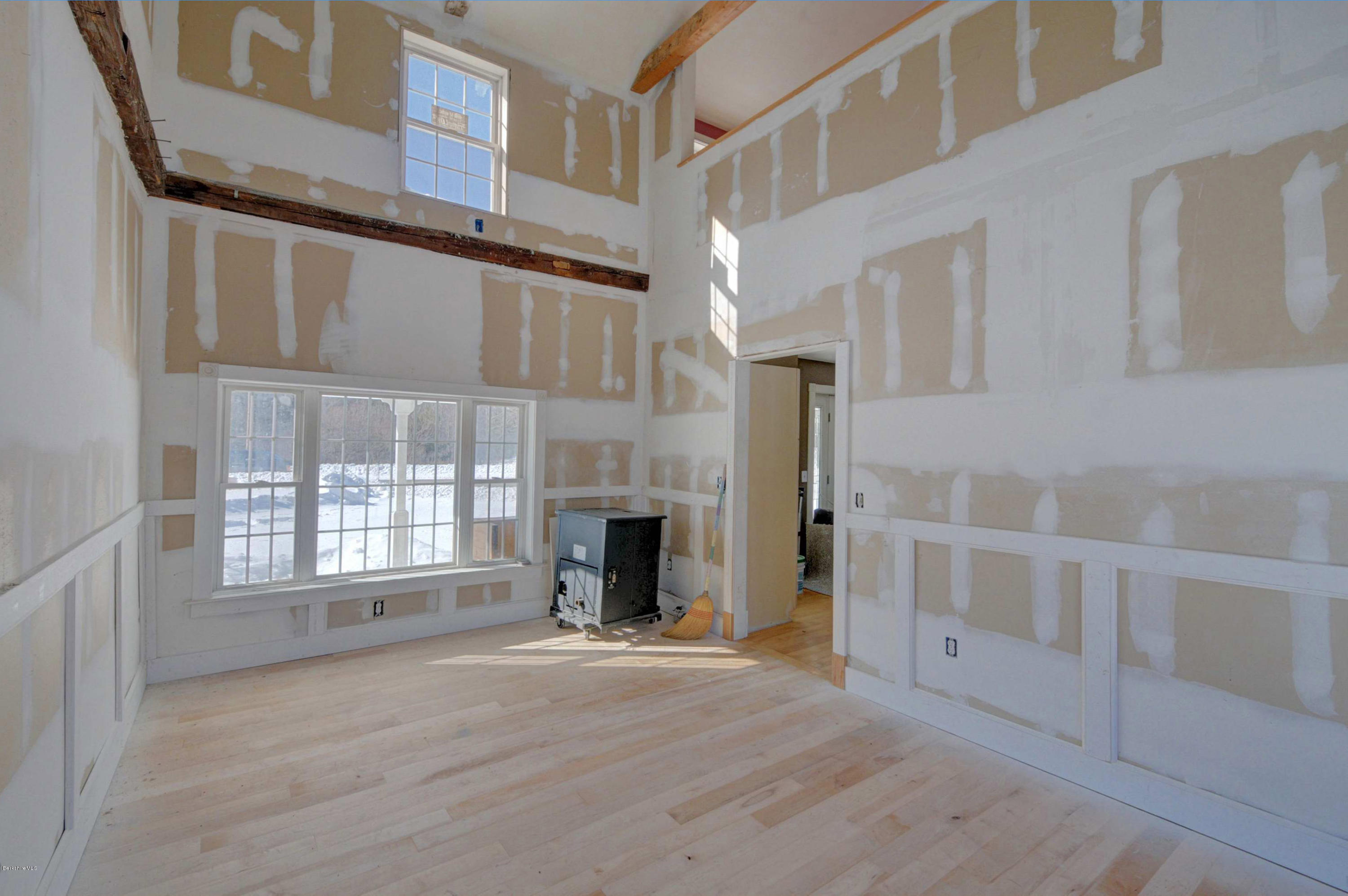 145 S Road Peru, MA 01235 - Photo 19 of 30 a view of an empty room with a fireplace and a window