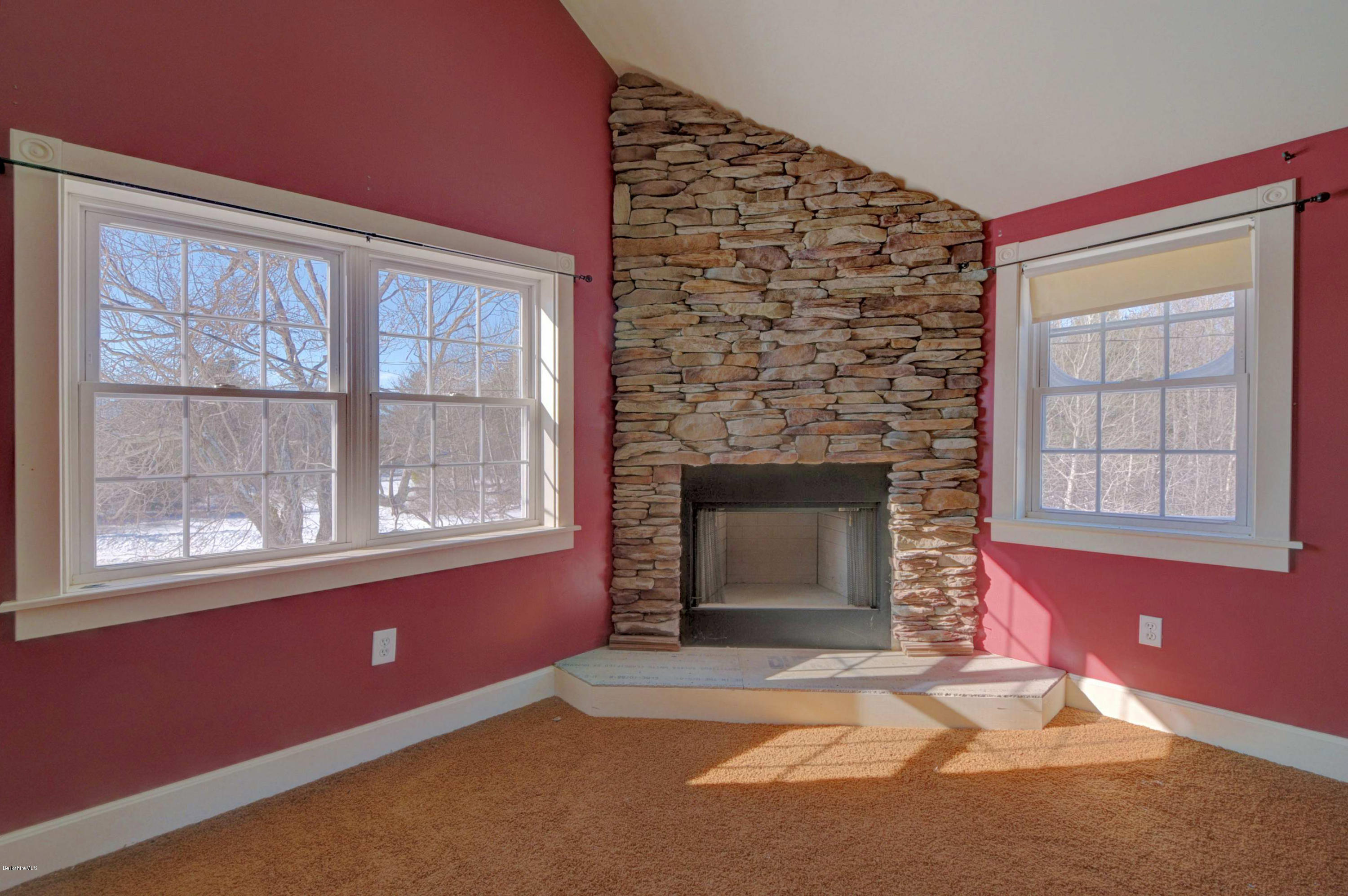 145 S Road Peru, MA 01235 - Photo 23 of 30 an empty room with windows and fireplace