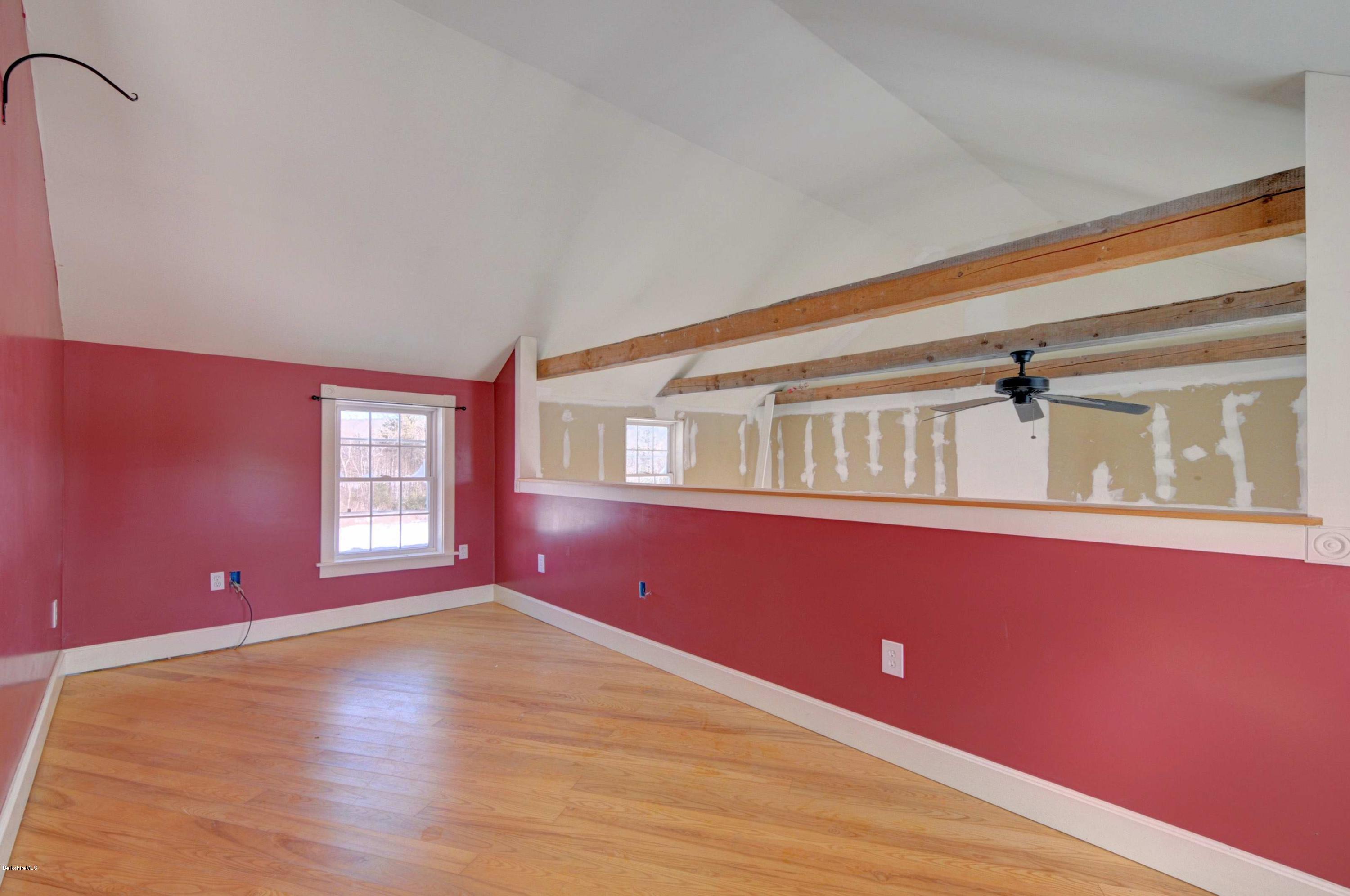 145 S Road Peru, MA 01235 - Photo 27 of 30 a view of an empty room with wooden floor and a window