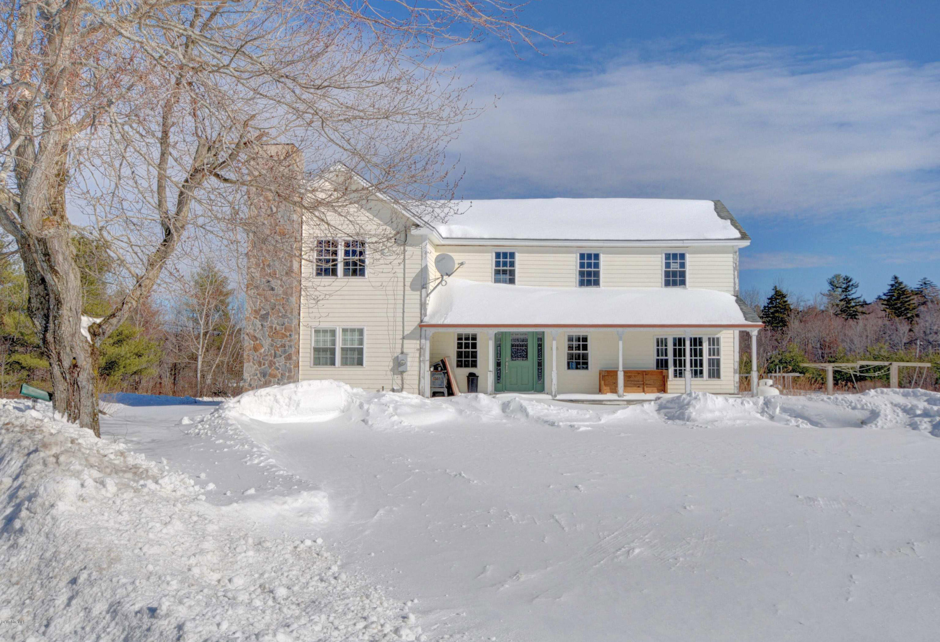 145 S Road Peru, MA 01235 - Photo 4 of 30 a front view of a house with a yard