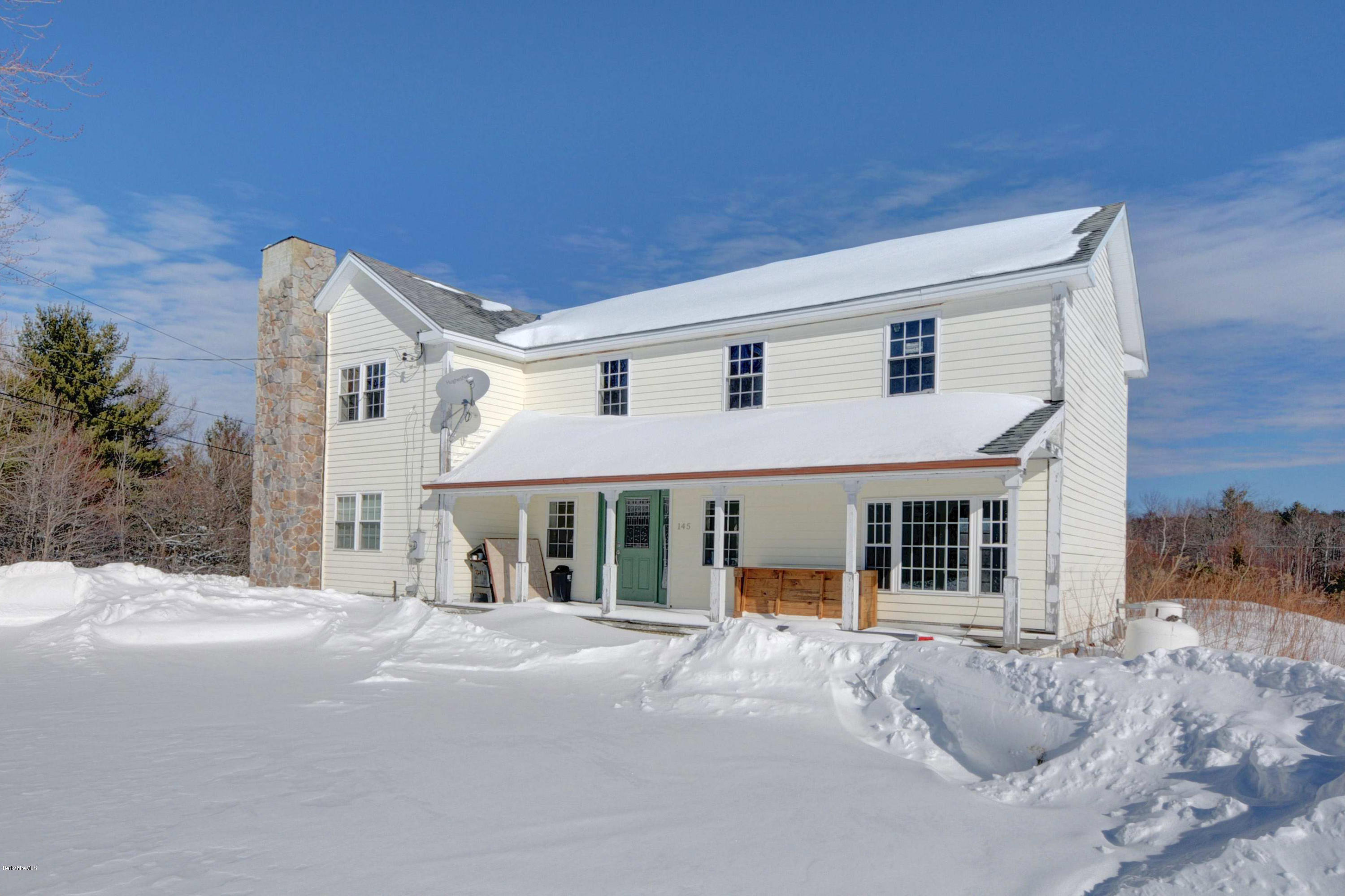 145 S Road Peru, MA 01235 - Photo 5 of 30 a front view of a house with windows
