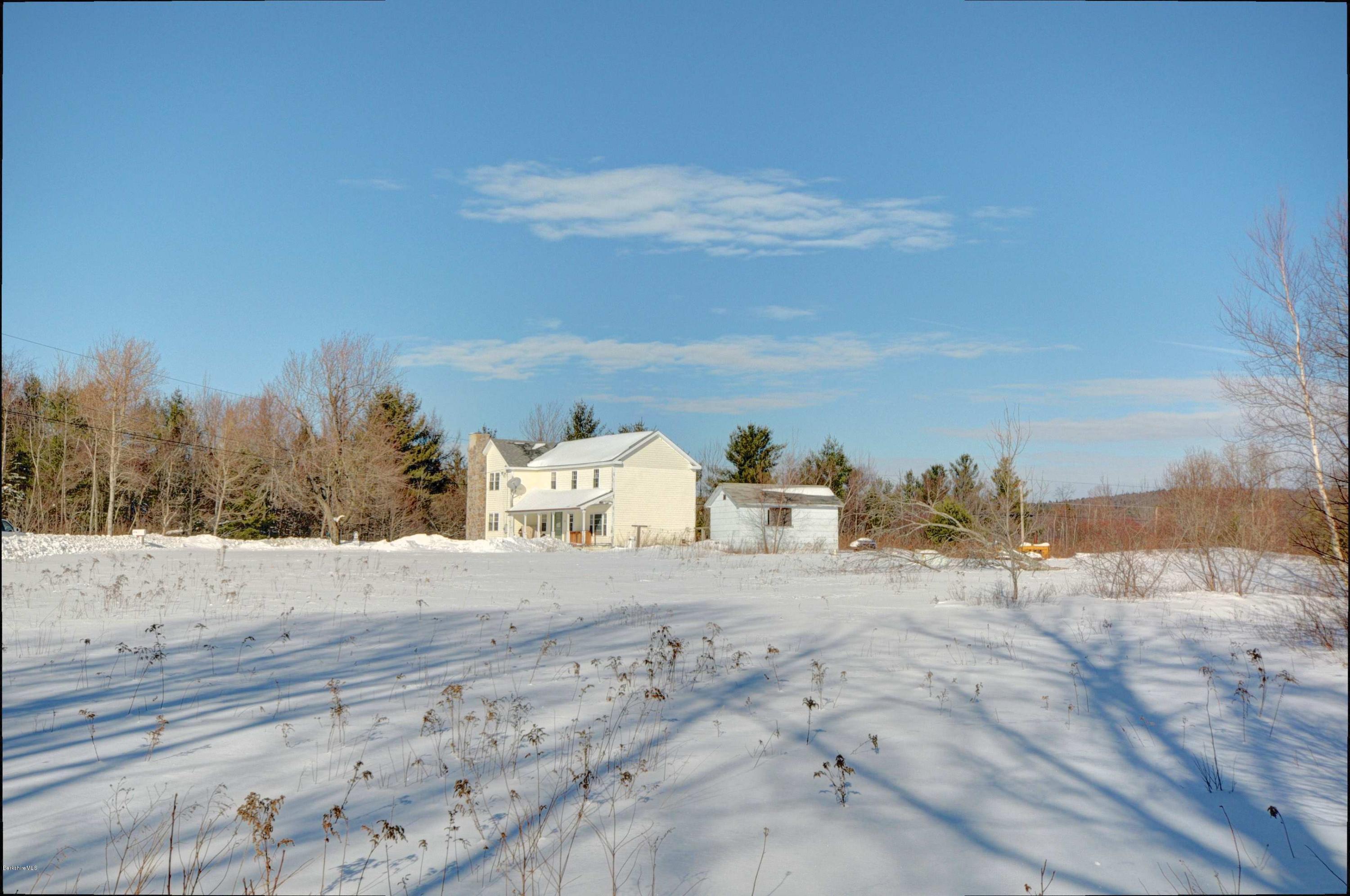 145 S Road Peru, MA 01235 - Photo 6 of 30 a view of dirt yard with large trees