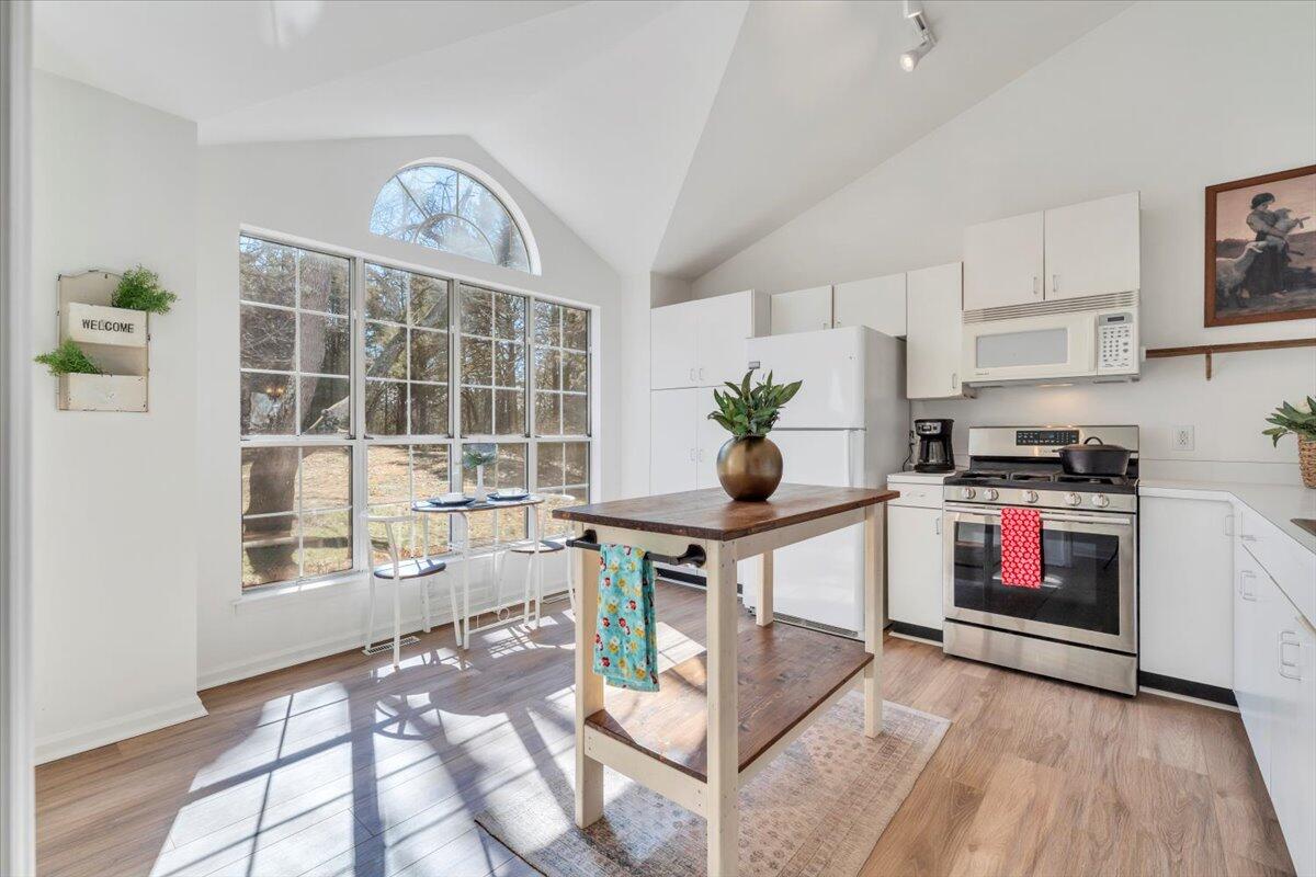 432 Arch Mill Road Buchanan, VA 24066 - Photo 22 of 72 a kitchen with stainless steel appliances a stove a refrigerator and a microwave