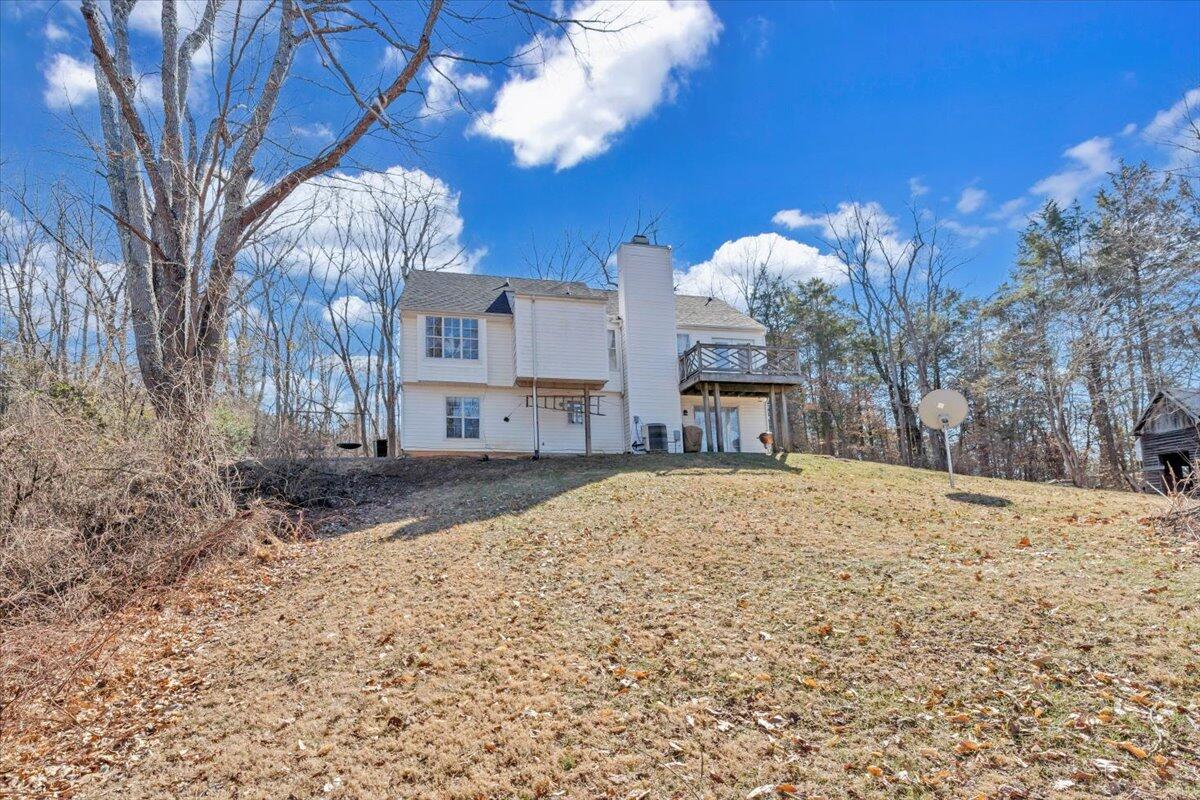 432 Arch Mill Road Buchanan, VA 24066 - Photo 61 of 72 a house view with a snow in front of yard