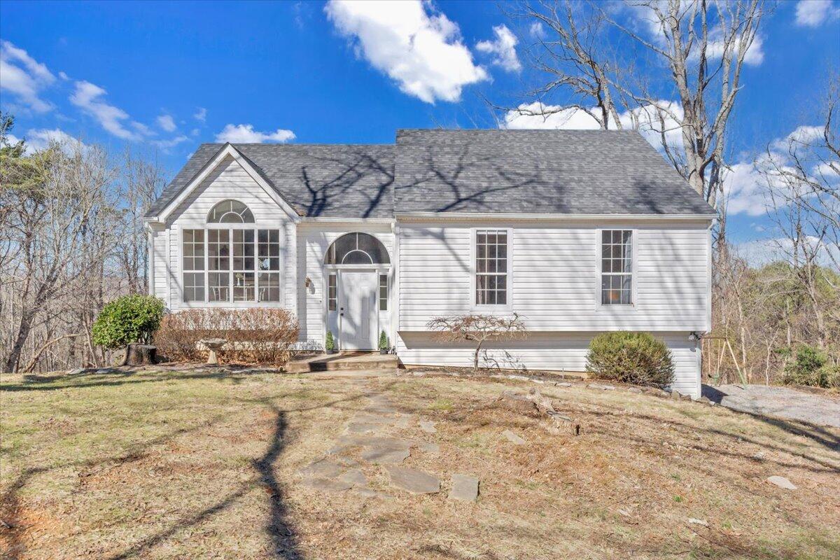 432 Arch Mill Road Buchanan, VA 24066 - Photo 62 of 72 a front view of a house with a yard