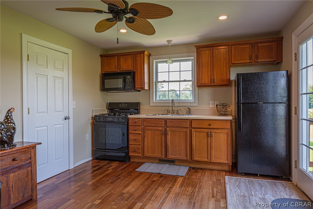 3861 Irvington Road Irvington, VA 22480 - Photo 26 of 30 Guest apartment kitchenette and living space.