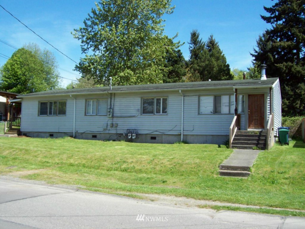 614 Index Avenue Northeast Renton, WA 98056 - Photo 14 of 14 a view of a house with backyard and sitting area