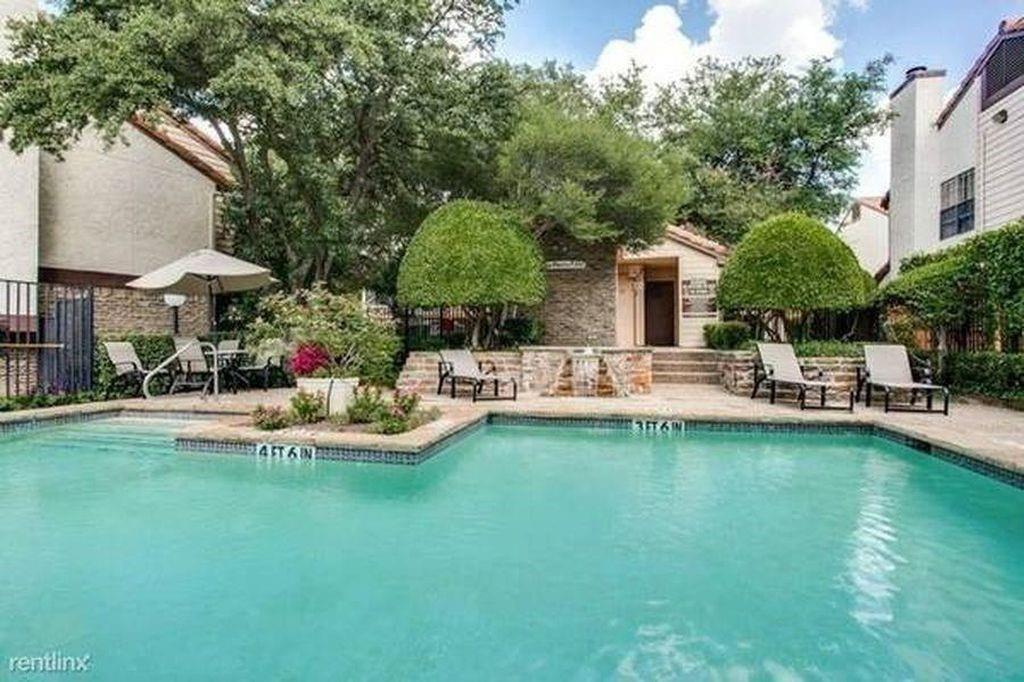 5626 Preston Oaks Road, Unit 39C Dallas, TX 75254 - Photo 13 of 38 Community pool with a patio area