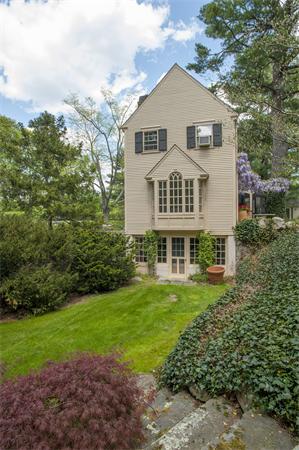 161 Main Street Hingham, MA 02043 - Photo 19 of 30 a front view of a house with garden
