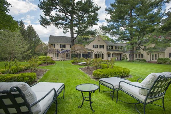 161 Main Street Hingham, MA 02043 - Photo 26 of 30 a view of a house with a yard chairs and table in a patio