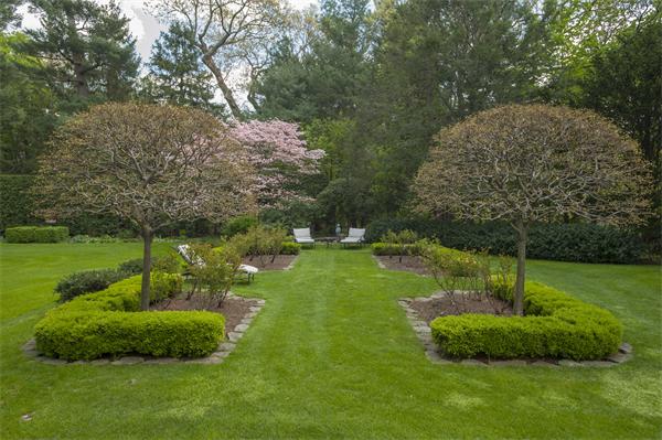 161 Main Street Hingham, MA 02043 - Photo 4 of 30 a view of a garden with a tree